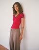 Image of Izolde Camiseta para bebé en rojo adrenalina con ribete azul marino y bordado M