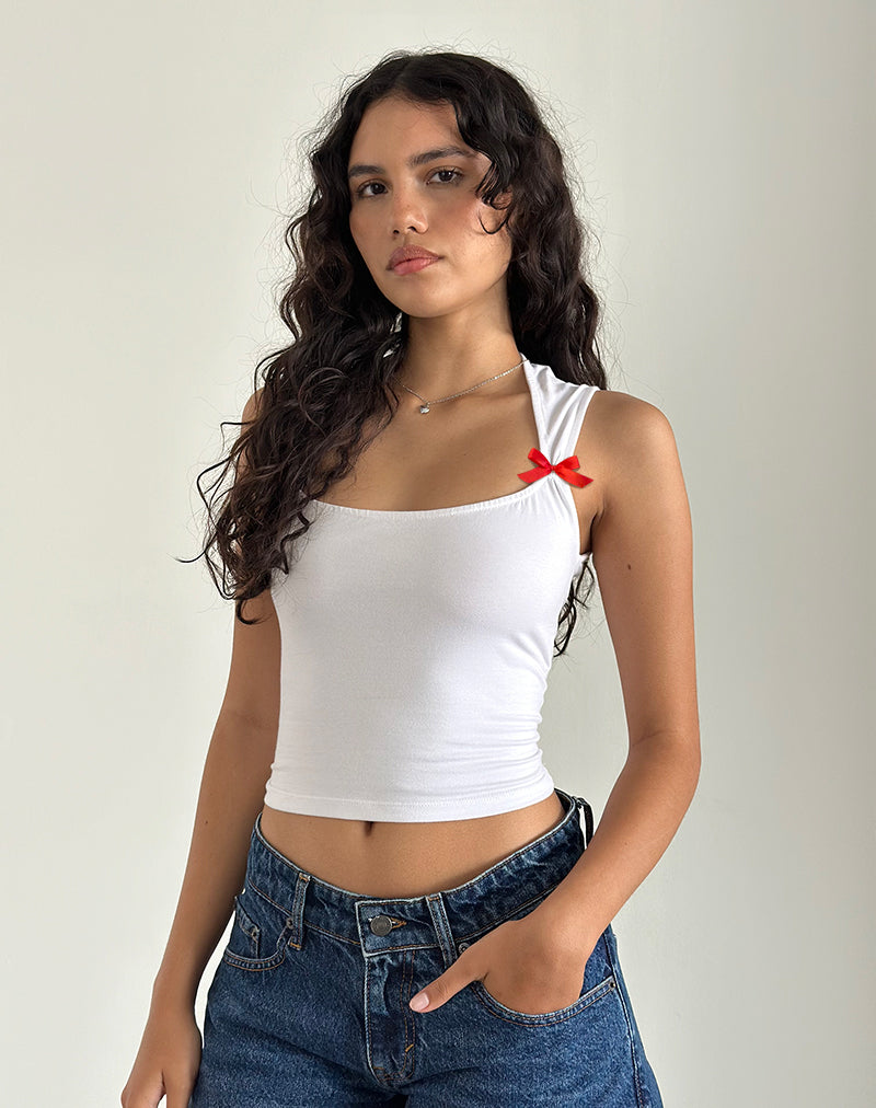 Jiniso Top en blanco con lazos rojos