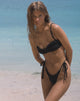 Imagen de braguita de bikini Lentra en broderie negro con volante
