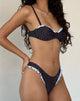 Imagen del sujetador de bikini Pafriza de polka negra y azul