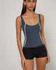 Imagen del chaleco Pilon Top en azul marino con ribete Sage