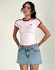 Image of Salda Top en rosa claro con ribete rojo Adrenaline y lazo bordado