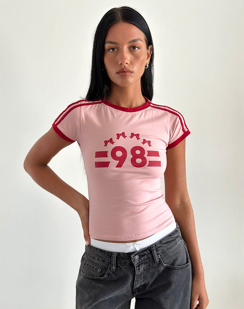 Camiseta Salda en rosa mujer con ribetes en rojo adrenalina y emblema "98
