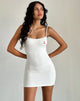 Imagen del minivestido Sunali en blanco roto con estampado de cerezas