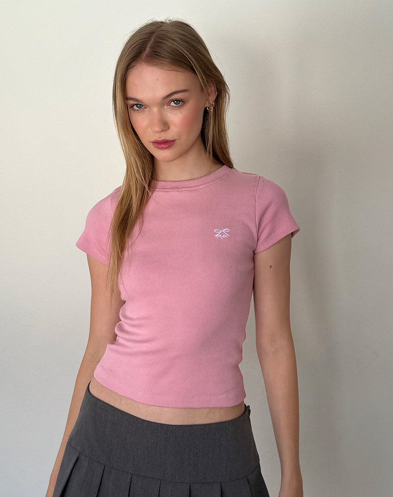 Camiseta de canalé Suti en rosa flamingo con lazo blanco bordado
