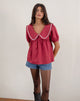 Imagen de la blusa Viana en rojo adrenalina con ribete blanco