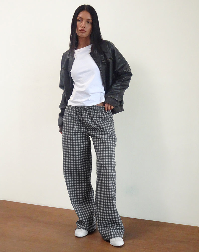 Pantalón Wasic de lino con pernera ancha en guinga tonal negra y gris