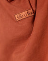 Ladrillo quemado Be Nice Label Embro