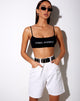 Imagen de los pantalones cortos Dad Jean en color crudo