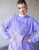 Imagen de sudadera Glo en lavado lila con bordado de dragón