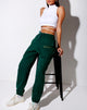 Imagen de Basta Jogger en verde botella con bordado Take Care Of Yourself