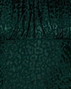 Guepardo satinado verde bosque