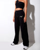 Imagen de Nattan Jogger en negro Angel Embro en verde neón
