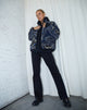 Chaqueta Nereo en azul rizado negro y marfil