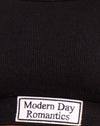 Negro Modern Day Romantics Label Embro