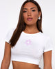 Imagen de Tindy Top en blanco con bordado de margaritas lilas