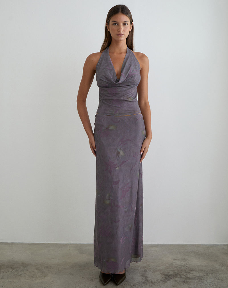 Imagen de la falda larga Alfreda con vuelo y estampado floral morado.