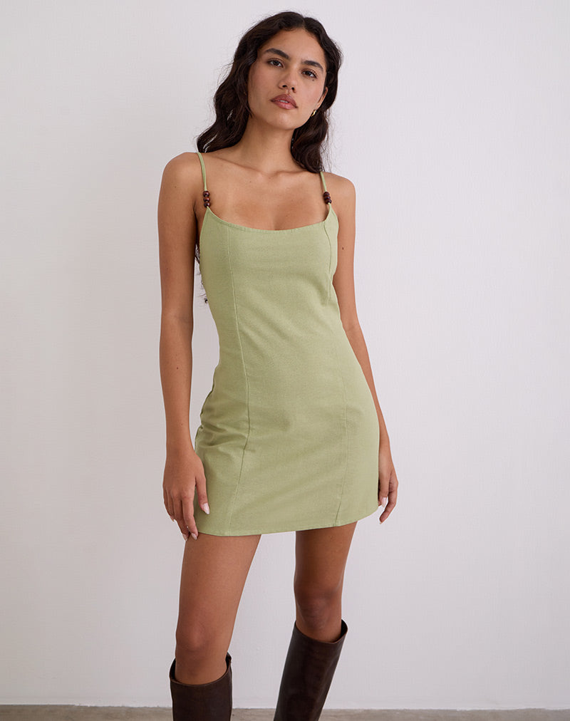Imagen del minivestido Ambra Scoop en verde salvia