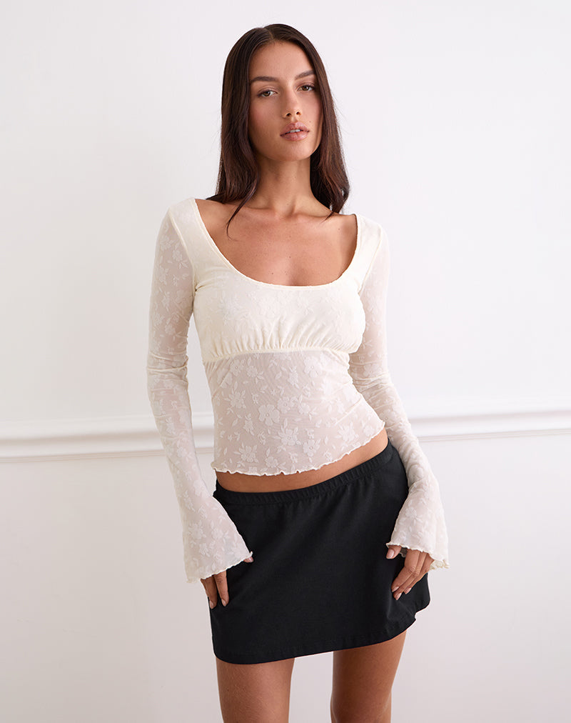 Top Aqsa de manga larga en flock floral Crema