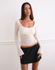 Imagen de Aqsa Top de manga larga en flock floral Crema