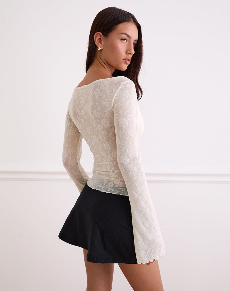 Imagen de Aqsa Top de manga larga en flock floral Crema