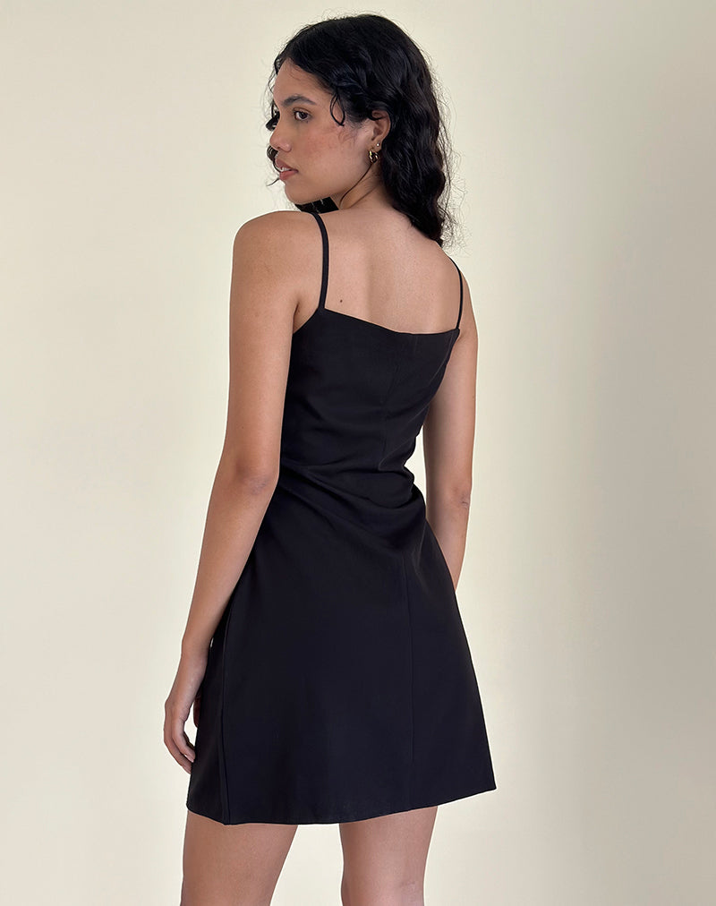 Imagen de Asinel Minivestido negro con lazo marfil
