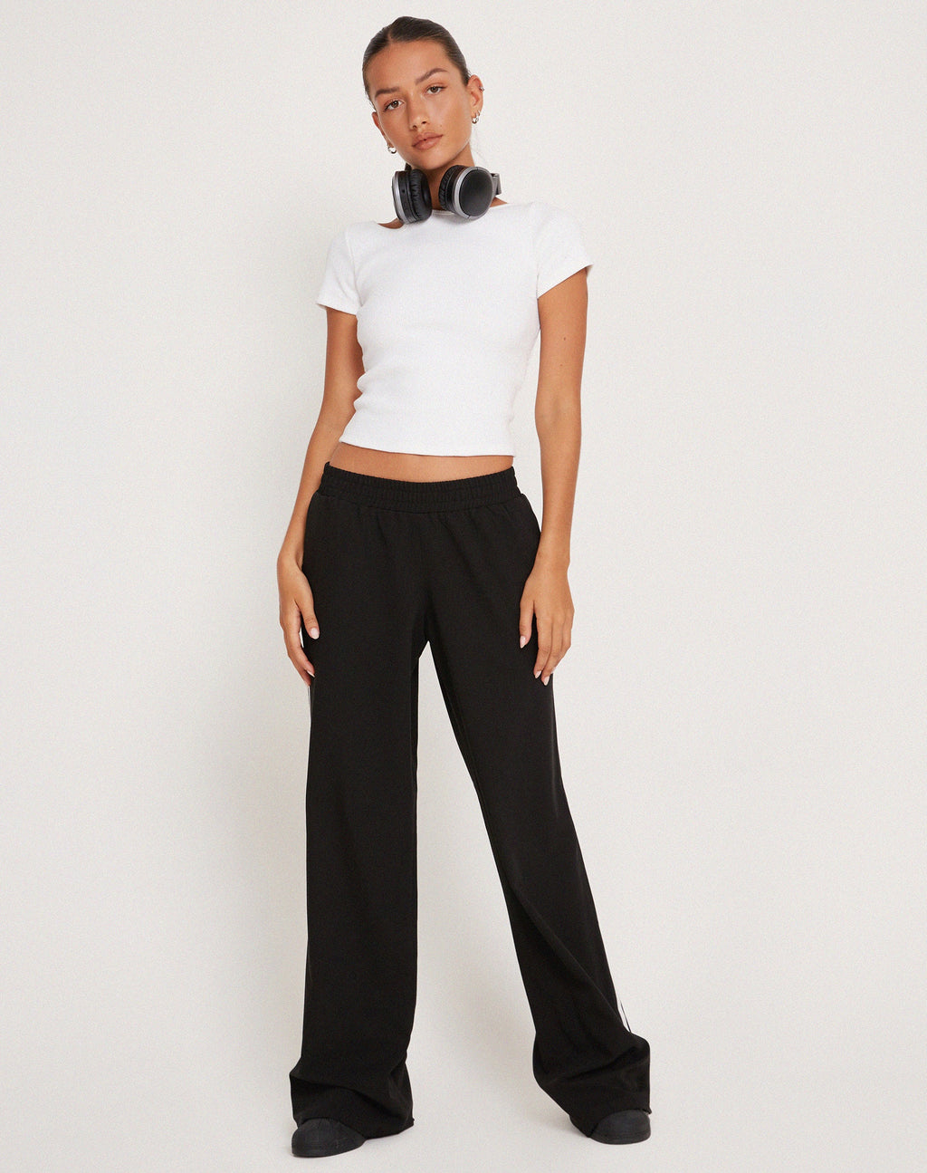 Pantalón Bennett de pata ancha en sastrería negro con raya blanca