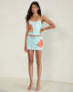 Imagen de la minifalda Nisrin azul con flor naranja