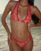 Imagen de la braguita de bikini Farida en naranja divertido floral con ribete en contraste