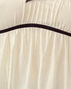 Crema con lazo central negro