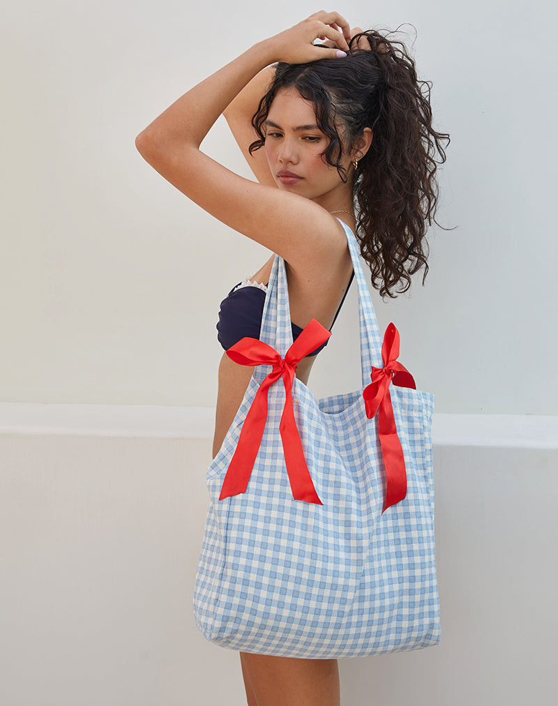 Bolso Barbara de guinga azul con lazo rojo