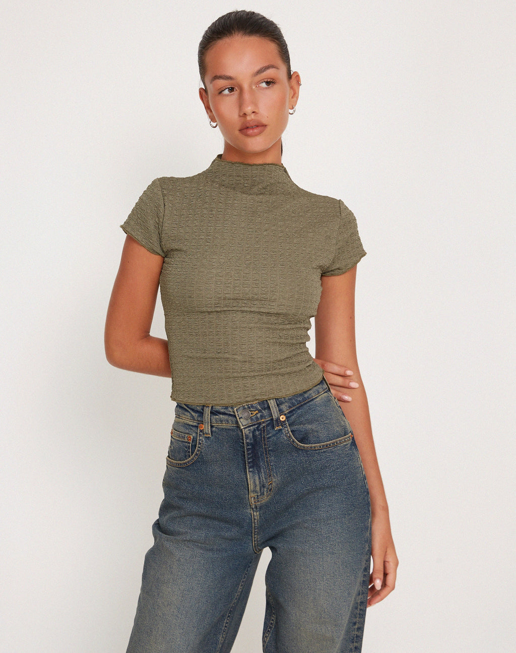 Top Elton de cuello alto en caqui