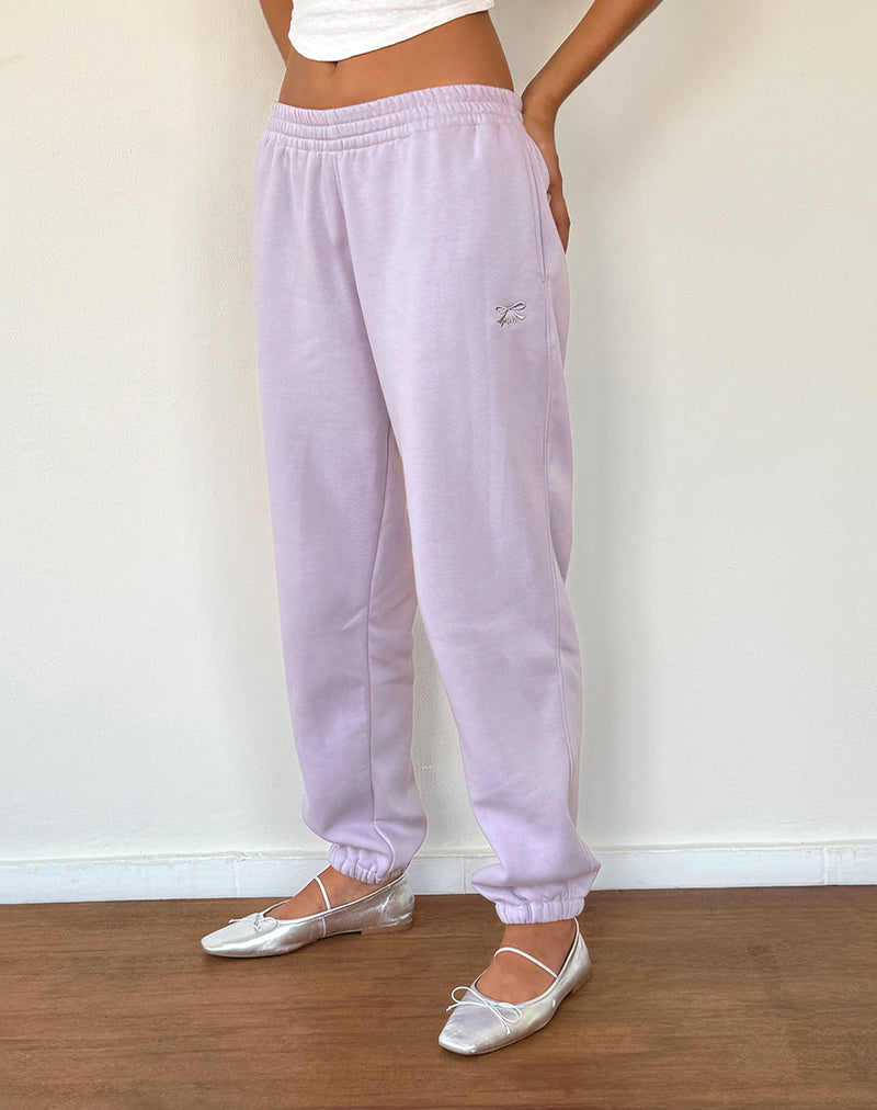Jogger Em en gris violeta con lazo bordado