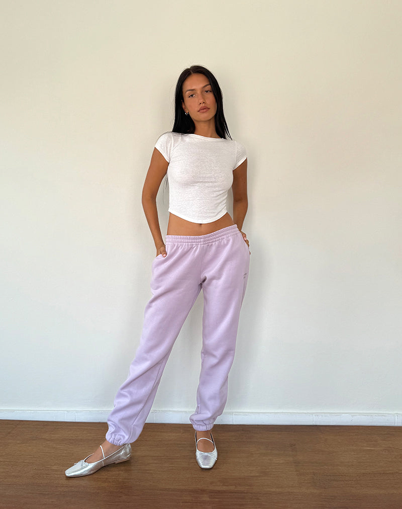 Jogger Em en gris violeta con lazo bordado