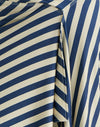 Raya diagonal crema y azul marino