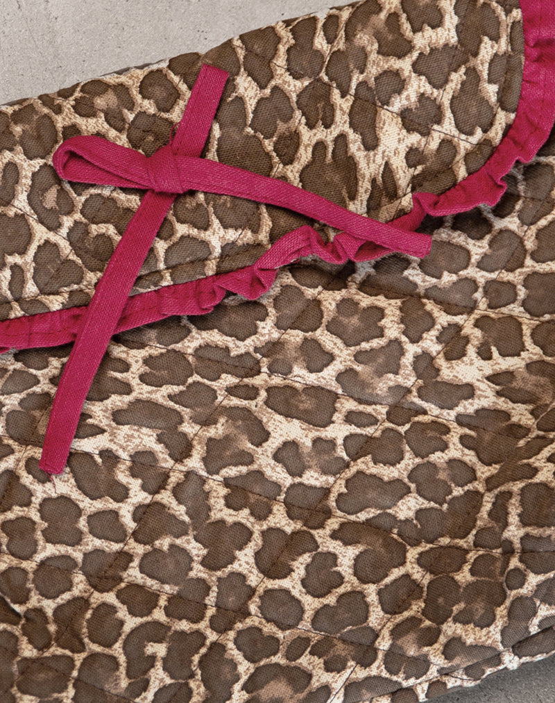 Neceser de maquillaje plegable de leopardo con lazo rojo de volantes