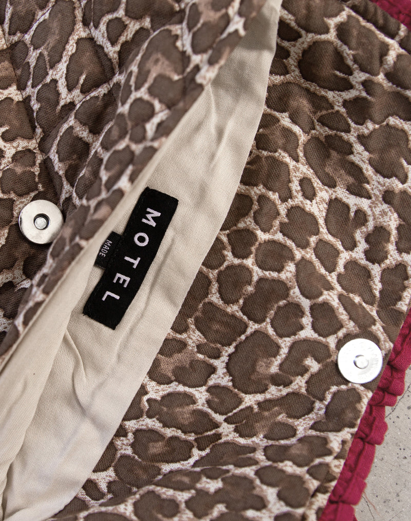Image of Bolsa de maquillaje plegable de leopardo con lazo rojo de volantes