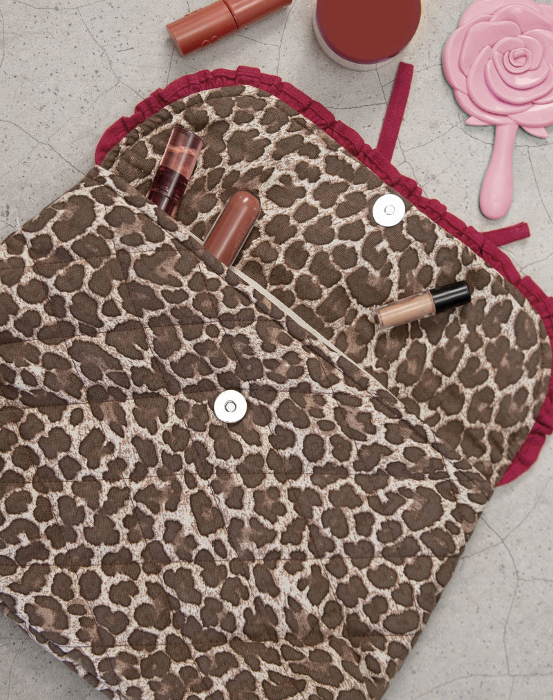 Image of Bolsa de maquillaje plegable de leopardo con lazo rojo de volantes
