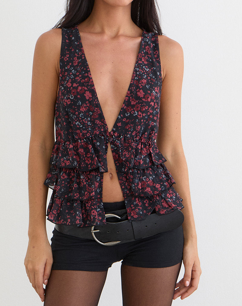 Imagen del top Gendhis en gasa con estampado floral disperso en negro y rojo.