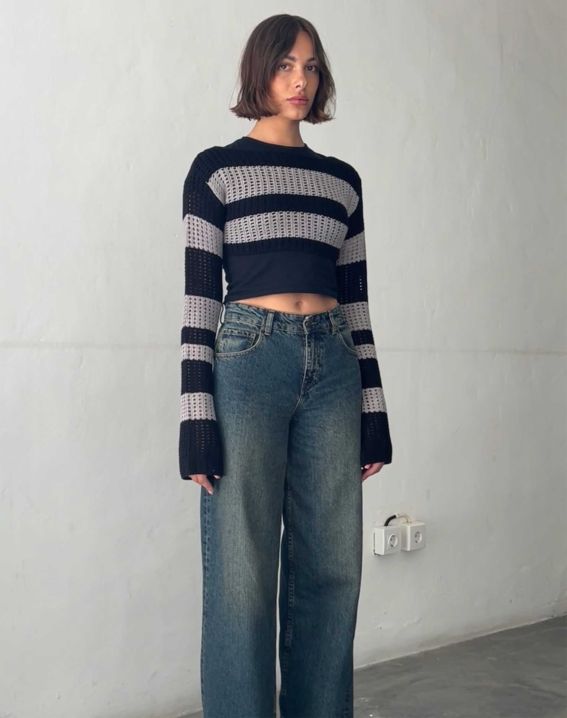 Imagen de Ozzy Bolero Top en Negro Gris