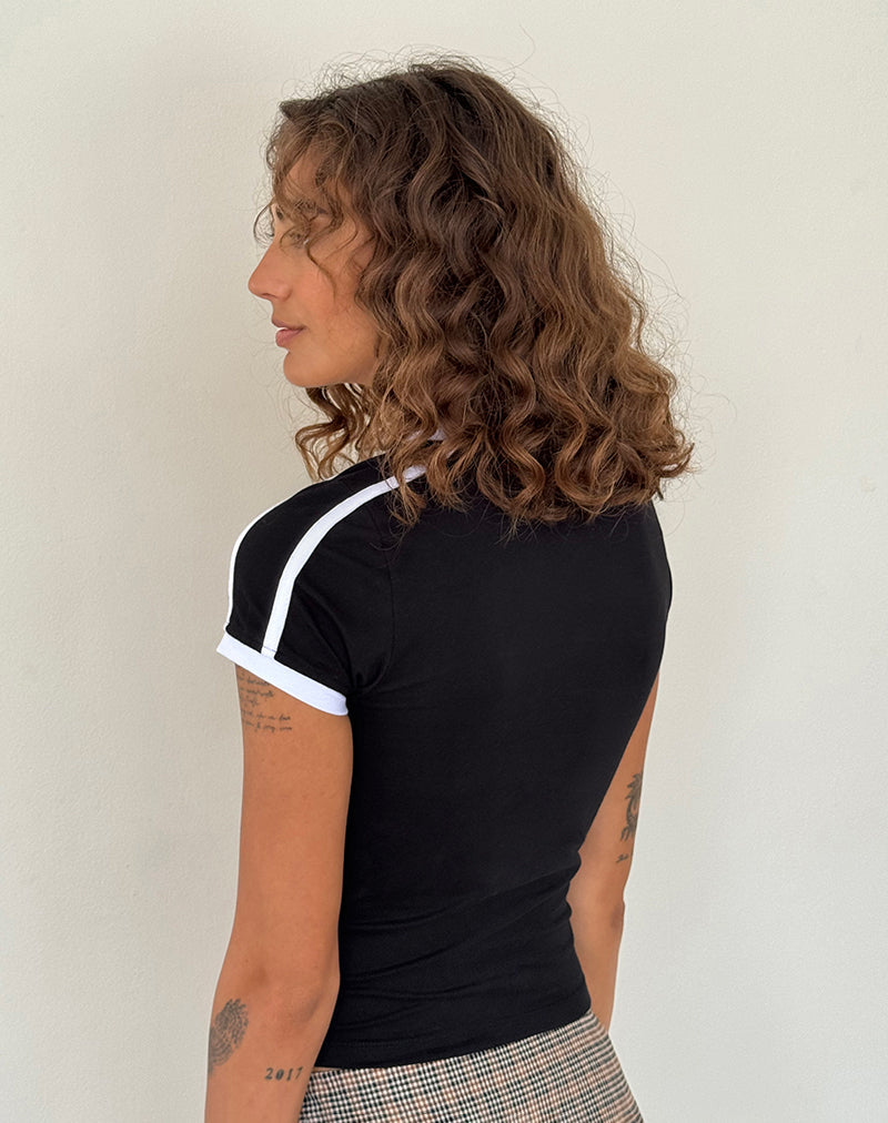 Image of Izolde Camiseta para bebé en negro con ribete blanco y bordado M