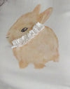 Blanco roto con estampado de conejos