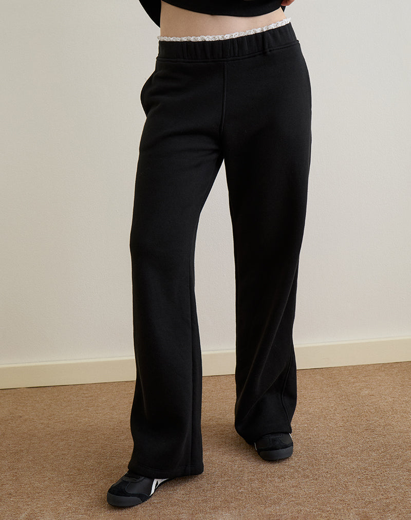 Jenita Loose Jogger en negro con ribete picotado blanco