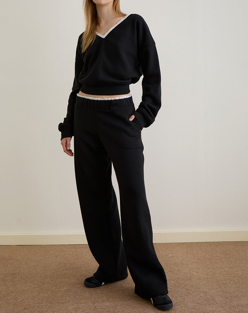 Imagen de Jenita Loose Jogger en negro con ribete picotado blanco