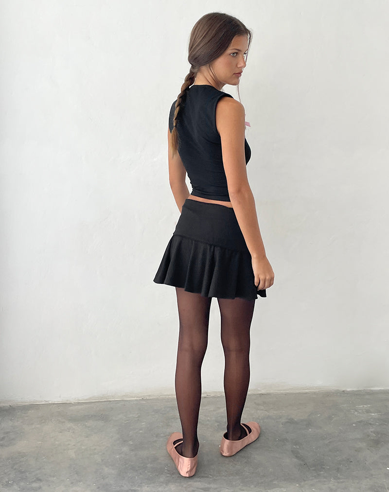 Imagen de Jiniso Crop top en negro con lazos rosas