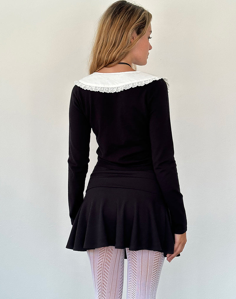 Imagen de Jodine Chaqueta de punto negra con volante blanco