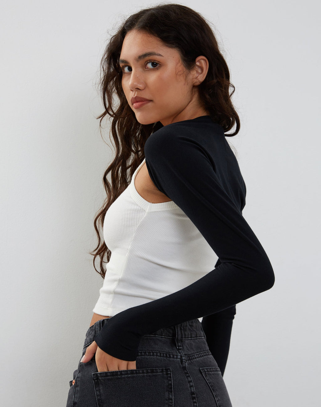Ladri Shrug Top en licra negra