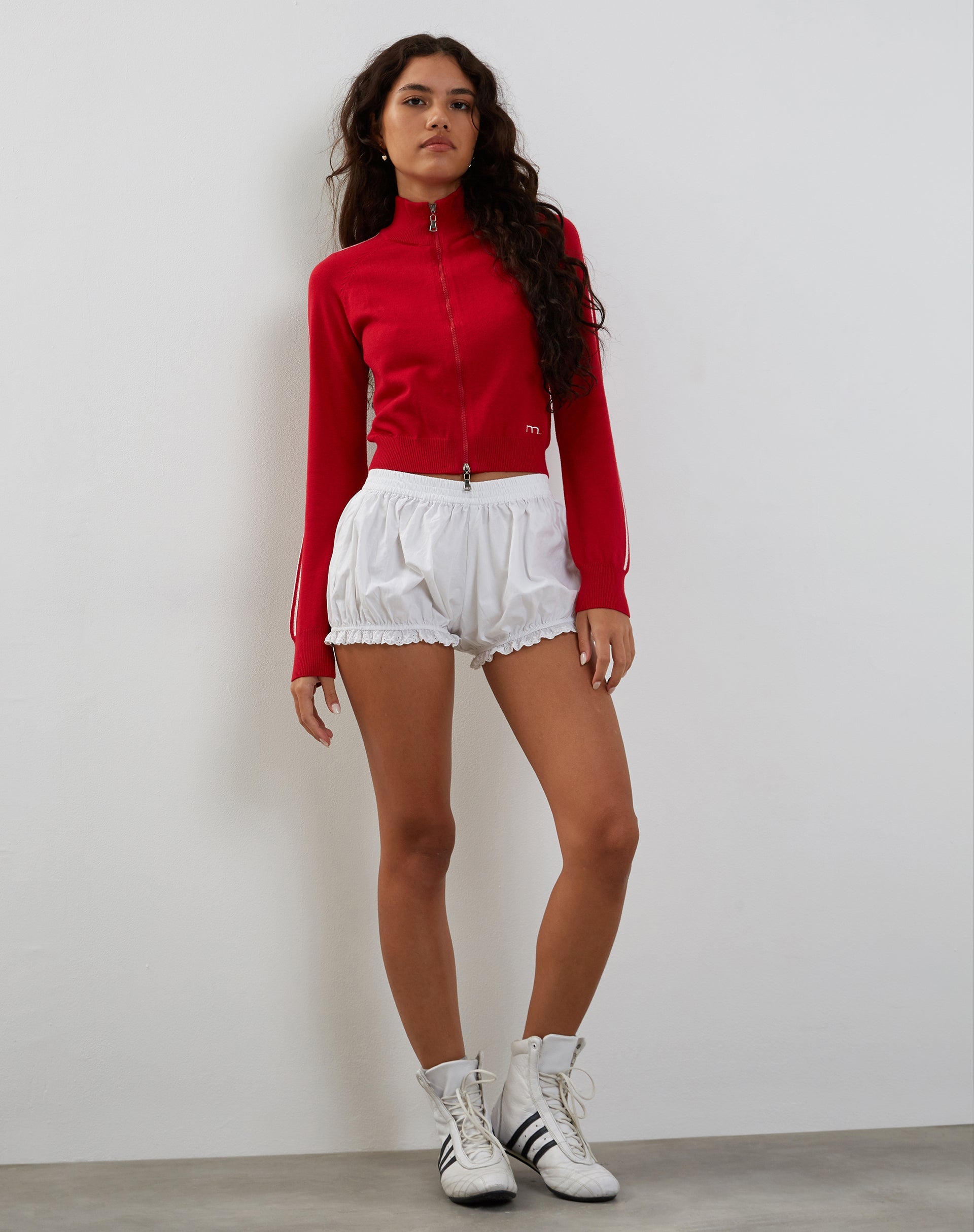 Imagen de la chaqueta Lennon Zip Up en rojo con rayas laterales blancas