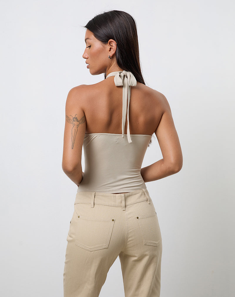 Imagen de Lorie Top cuello redondo en Cupro Oatmilk con anillo metálico