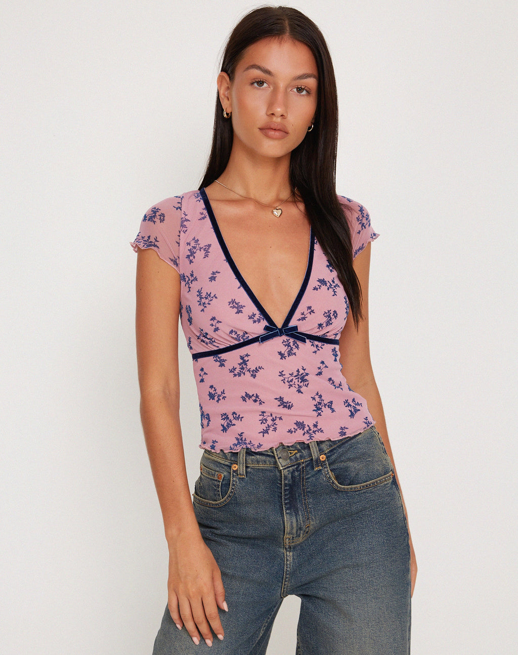 Top de malla Livi en flocado botánico rosa y azul marino